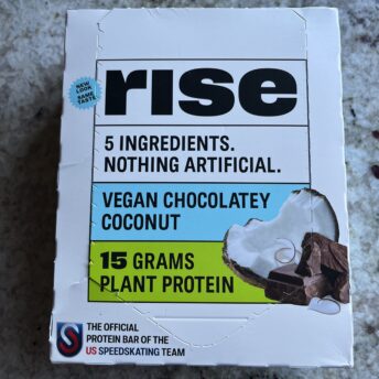 Gluten-free vegan chocolatey coconut protein bar by Rise Bar