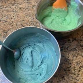 Blue and green cake batter for Checkerboard Cake