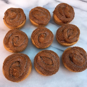 Nine gluten-free Double Maple Cupcakes