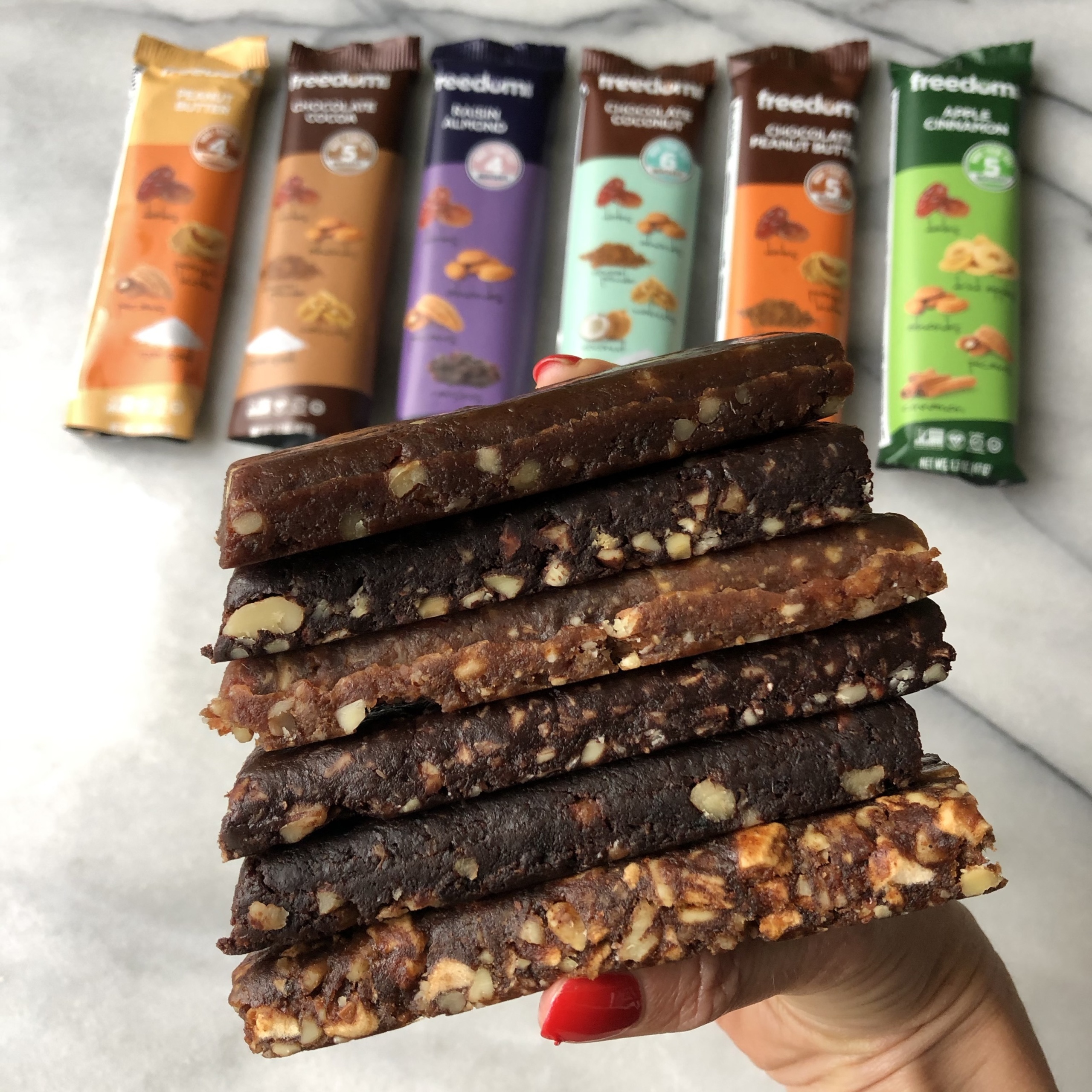 Stack of gluten-free bars by Freedom Bar