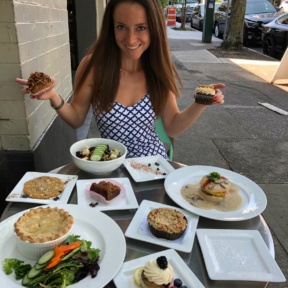 Jackie eating gluten-free desserts at Petunia's Pies & Pastries