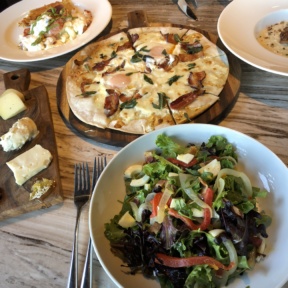 Gluten-free pizza, cheese board, salad, and lobster scramble from N.10
