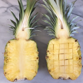Cutting the pineapple for the pineapple boats