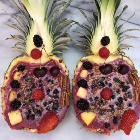 Smoothie in Pineapple Boats with fresh and dried fruit
