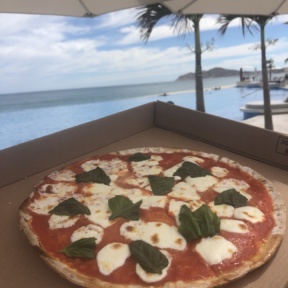 Gluten-free pizza by the pool from Blanc Pizza