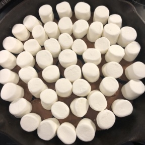 Peanut Butter Cup S'mores Skillet Dip going in the oven
