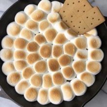 Peanut Butter Cup S'mores Skillet Dip with graham crackers