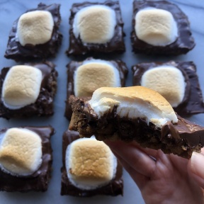 Taking a bite of S'mores Bars