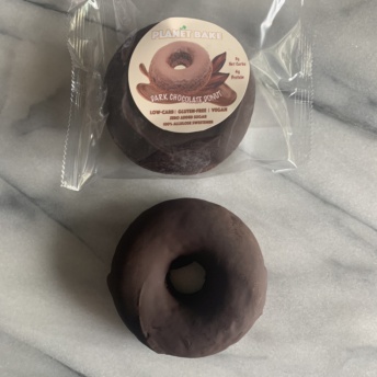 Gluten-free dark chocolate donut by Planet Bake