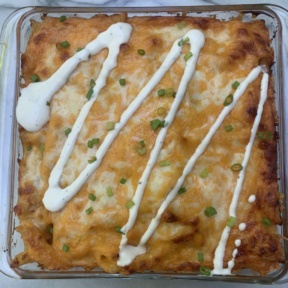 Gluten-free Buffalo Chicken Pasta Bake with ranch drizzle