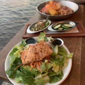 Salmon salad, crab ceviche, and seafood boil from Paddlefish