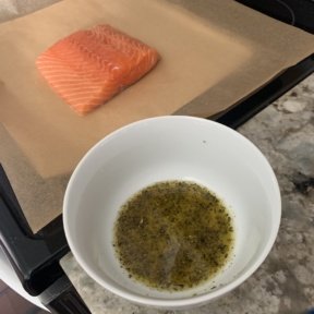 Ready to add lemon juice and herbs to Baked Salmon