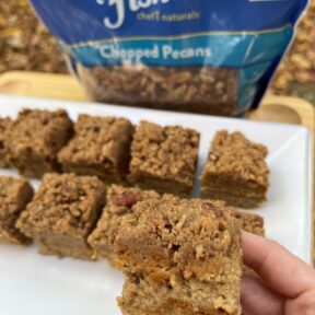 Ready to eat these gluten-free Pumpkin Pecan Crumble Bars made with Fisher Nuts